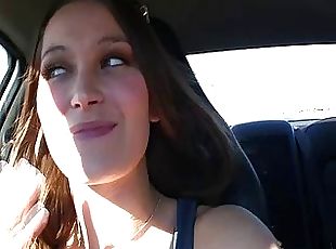 Trinity sexy young amateur with long hair taking a ride and licking her finger in the car