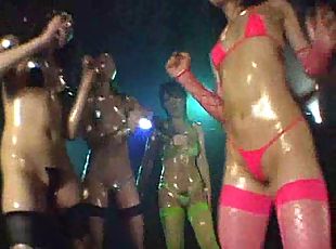 Luxurous babes in bikini shaking their oiled bodies in outdoor party