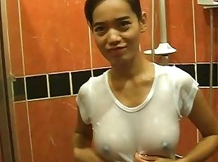 Breath taking Asian babe in the shower rubbing on